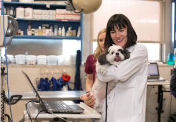 Dr. Heather Brausa holding patient