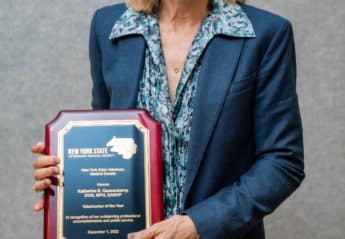 Dr. Katherine Quesenberry with her Veterinarian of the Year Award