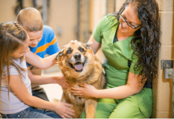 A Veterinary Professional with Children and a Dog